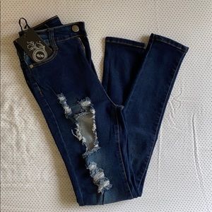 High wasted dark Denim destroyed skinny jeans